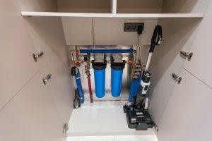 Water filter housing. Drinking Water System. Osmosis water purification filter for home use. healthy lifestyle. High quality photo
